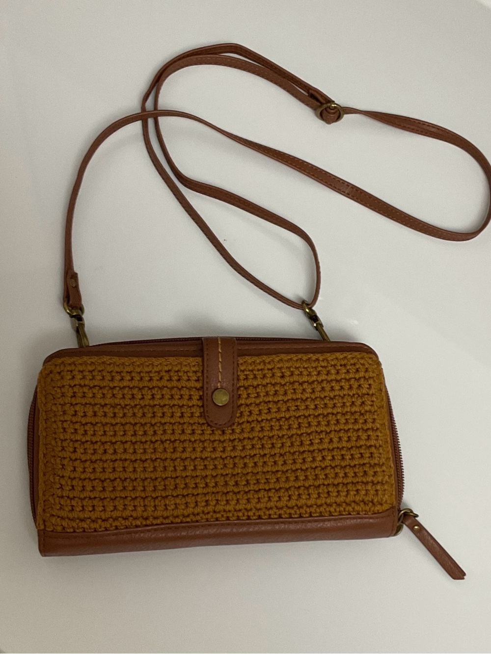 The Sak Tan Crocheted Crossbody Wallet with Adjustable Strap and charm